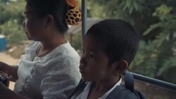 M/S Myanmar boy and mother in school bus Stock Footage