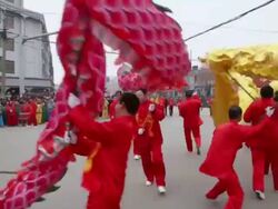 MS TS Villagers perform dragon dance in traditional festive folk celebration or carnival during chinese spring festival AUDIO / xi'an, shaanxi, china Stock Footage