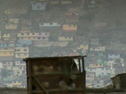 "L-R pan of part of San Cristobal slum, Hill San Cristobal  [Cerro San CristÃƒÂ³bal], cloudy day, Lima, Peru [PerÃƒÂº]" Stock Footage