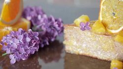 Fresh piece of orange cake Stock Footage