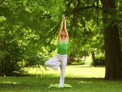 Young woman doing yoga exercise Stock Footage