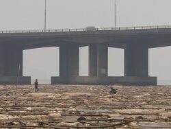  MS Shot of bridge and children fishing / Lagos, Nigeria Stock Footage