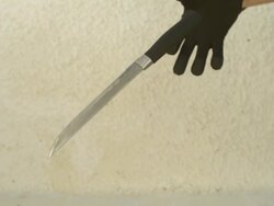 High Speed Knife caught by gloved hand, Spain. Stock Footage