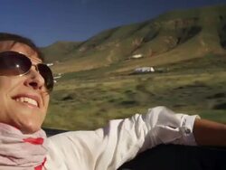 Woman enjoys car ride Stock Footage