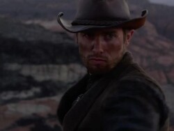 'Cowboy turns around, grabs chest as he gets shot.' Stock Footage