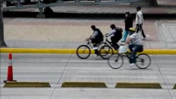 CLEAN : Bogota residents hop on bikes for Car Free Day News Clip