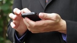 Businessman using mobile phone Stock Footage