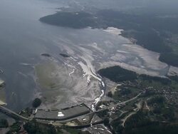 AERIAL WS Landscape with water treatment plant / Vilaboa, Galicia, Spain Stock Footage