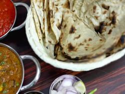 Variety of Indian Food served on a Dining Table Stock Footage