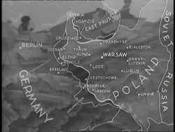 A map illustrates the German invasion of Poland while airplanes, tanks and cannons fire. News Clip