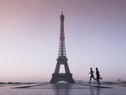 couple running in front of the Eiffel tower Stock Footage