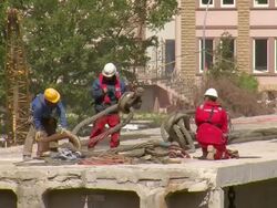MS Workers working at deconstruction of bridge over river Mosel / Wellen, Rhineland Palatinate, Germany Stock Footage