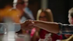 Restaurant owner shakes hands with customers at bar Stock Footage