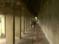 LS Tourists viewing bas-relief mural at Angkor Wat / Cambodia Stock Footage
