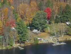WS ARIEAL View of Wooden dock with river /Maine, United States Stock Footage