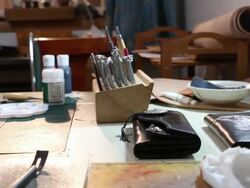 leatherworker paint  fish pattern on leather Stock Footage