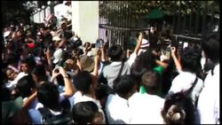 Myanmar - Myanmar begins release of some prisoners after clemency order / Opposition leader Aung San Suu Kyi registers for election / Myanmar's president Thein Seinn in Hanoi for talks News Clip