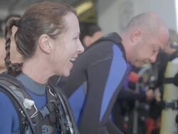 MS People preparing for scuba diving / Socorro Islands, Mexico Stock Footage