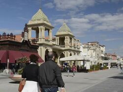 WS View of People walking at beach promenade with Art Nouveau Gran Caffe Margherita / Viareggio, Tuscany, Italy Stock Footage