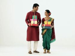 Marathi Couple showing lots of gift box  Stock Footage