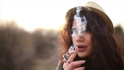 Beautiful girl Smoking marijuana Stock Footage