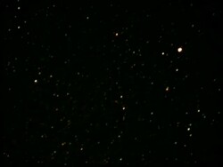 T/L Stars orbiting around sky, day to night to day Stock Footage