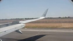 Plane landing at Culiacan airport from window News Clip