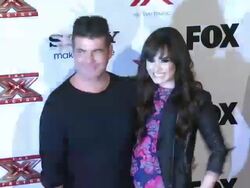 Demi Lovato, Simon Cowell at The X Factor Viewing Party Sponsored By Sony X Headphones on 12/06/2012 in Los Angeles, CA.(Footage by WireImage Video/Getty Images Entertainment Video) Stock Footage