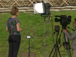 MS PAN Shot of television news crews working outside during G8 meeting / Hokkaido Toyako, Japan Stock Footage
