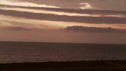 Lonely fisherman at red sunset. Stock Footage
