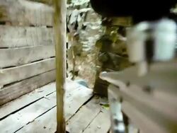 Paintball Player Occupying Defensive Position Stock Footage