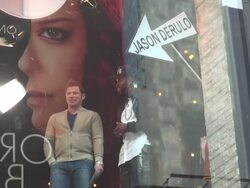 Nick Lachey, host of VH1â€™s Big Morning Buzz Live show & his guest Jason Derulo in the window Stock Footage