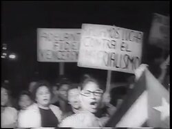 B/W 1962 crowd of women carrying posters in demonstration at night / Cuban Missile Crisis / newsreel Stock Footage