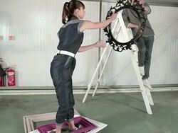 Young couple holding picture frames Stock Footage