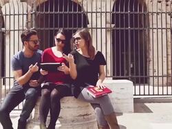 Tourists in Rome with guide and digital tablet Stock Footage