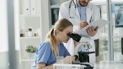 Multiethnic Scientist Doing Research in Laboratory Stock Footage