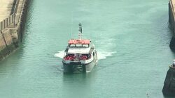 Rescued migrants being taken ashore in Dover News Clip