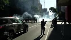 Police clash with Brazilian demonstrators over handling of COVID-19 crisis News Clip