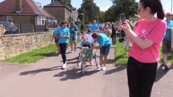 ‘Captain Tobias’ completes marathon fundraiser with help from Olympic champion News Clip