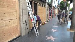 Boarding windows anticipating destruction caused by BLM protests News Clip