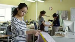 Female Designer Showing Samples to Client Stock Footage
