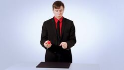 How to Do the Top-of-Fist Vanish Magic Trick Instructional Video