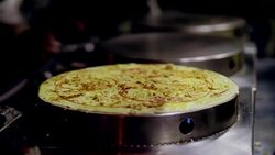 Making crepe on hot pan, Street food in Thailand Stock Footage