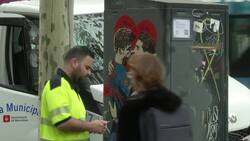 Graffiti shows rival footballers kissing Instructional Video