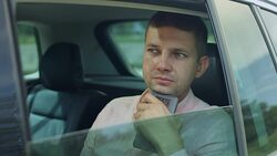Thoughtful entrepreneur making phone call in car Stock Footage