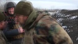 CLEAN : Heavy fighting rages on in eastern Ukraine as death toll mounts News Clip