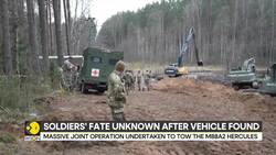 Four US soldiers still missing after armoured vehicle found News Clip
