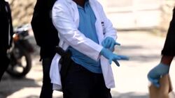 CLEAN : Haitian police and forensics investigate outside presidential residence News Clip