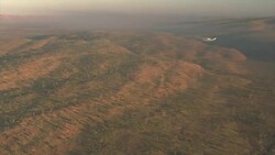 Small aircraft flying over the Kimberley lowlands, Western Australia Stock Footage