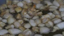 Frying pork Stock Footage